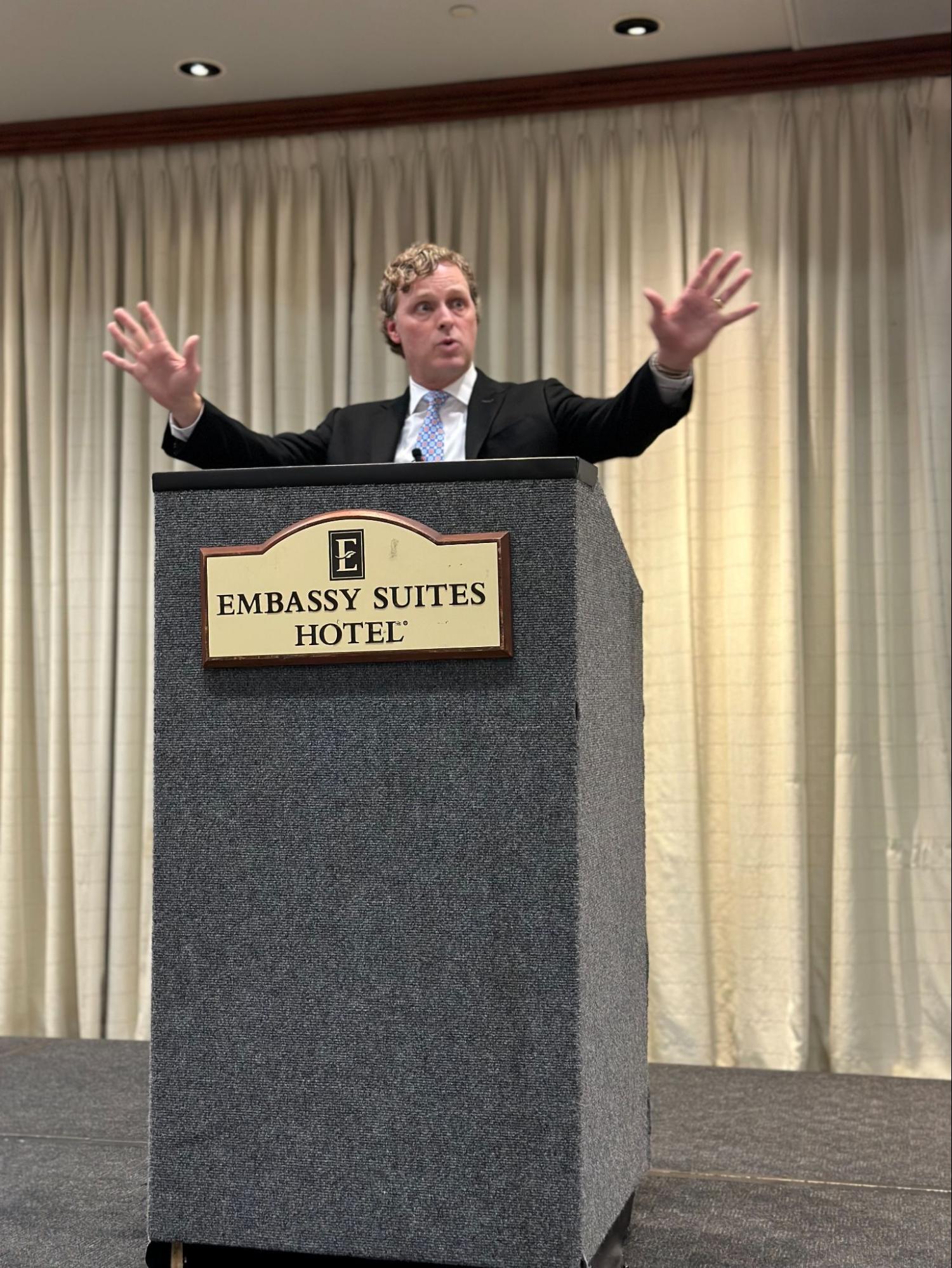 zack schuch presentation podium photo